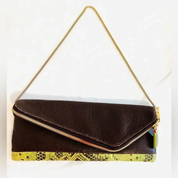 Henri Bendel leather fold over asymmetrical slim clutch